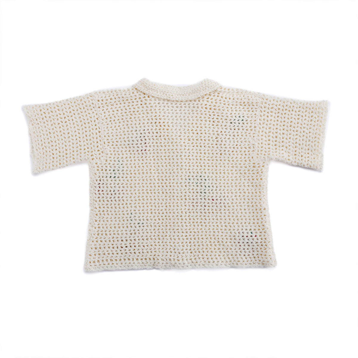 Crochet Fruit Bowl Camp Shirt made using Bernat yarn in a styled lifestyle setting