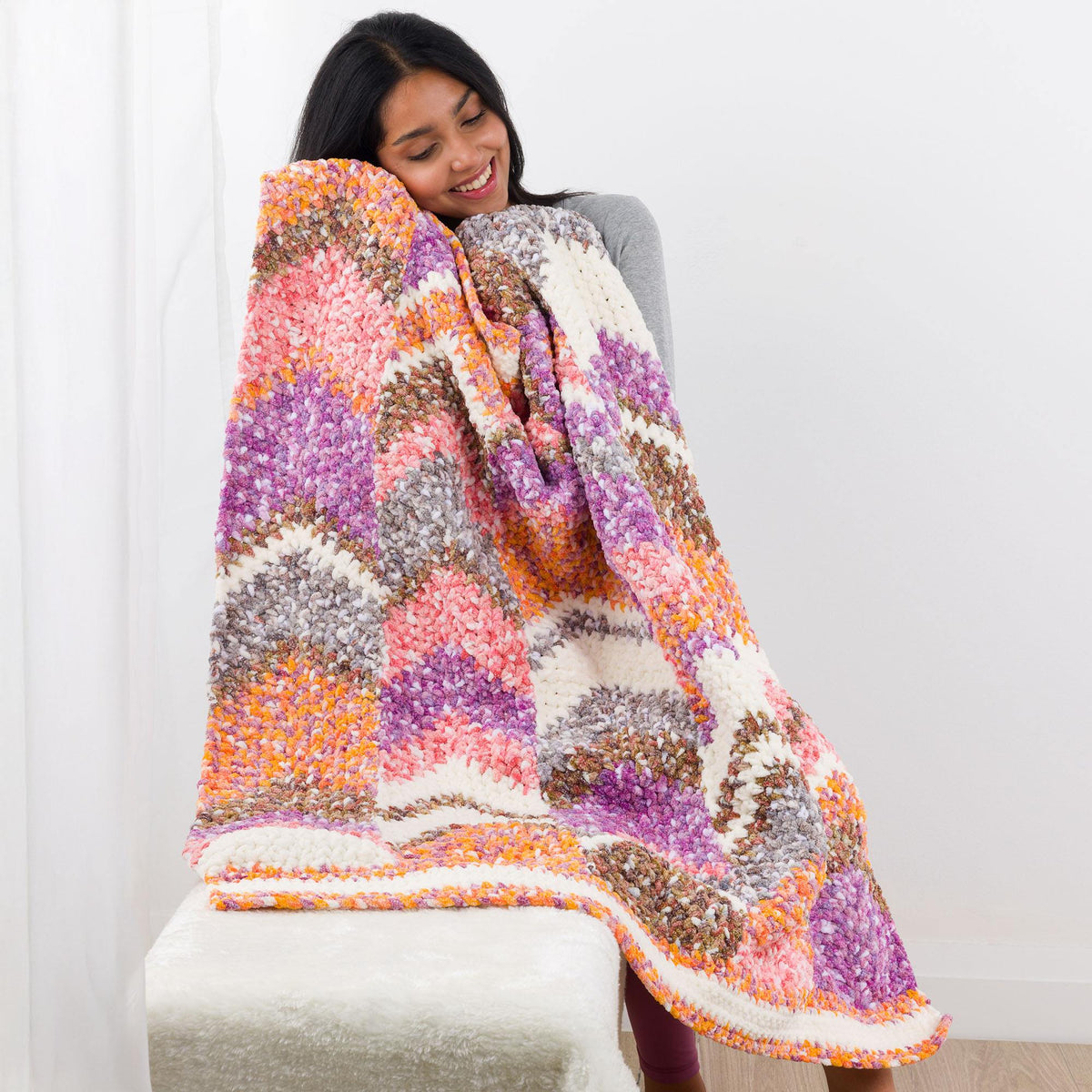 Moss Stitch Peaks Crochet Toddler Blanket made using Bernat yarn
