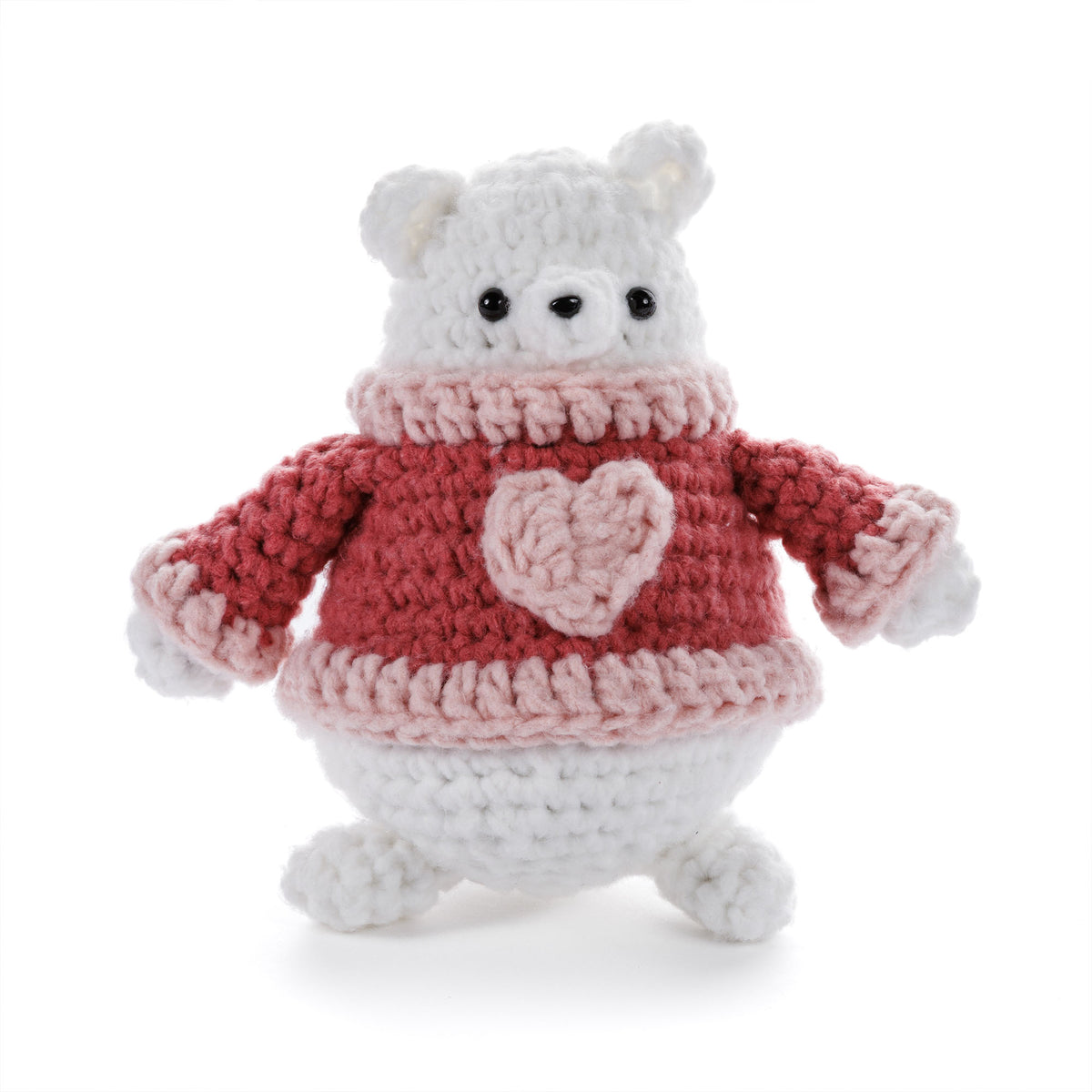Heartley The Crochet Bear made using Bernat yarn in a styled lifestyle setting