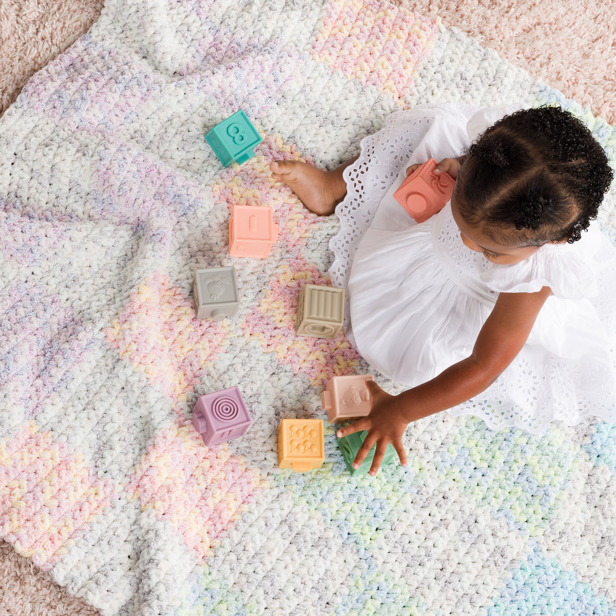 Crochet Checkerboard Toddler Blanket made using Bernat yarn