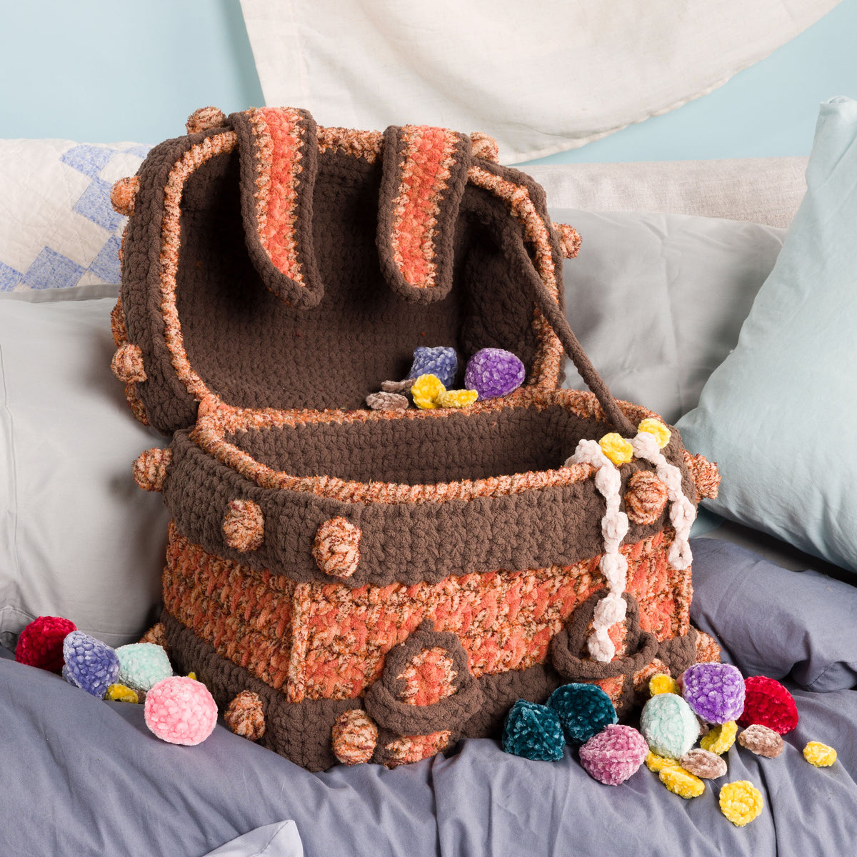 Treasure Crochet Chest Play Set made using Bernat yarn in a styled lifestyle setting