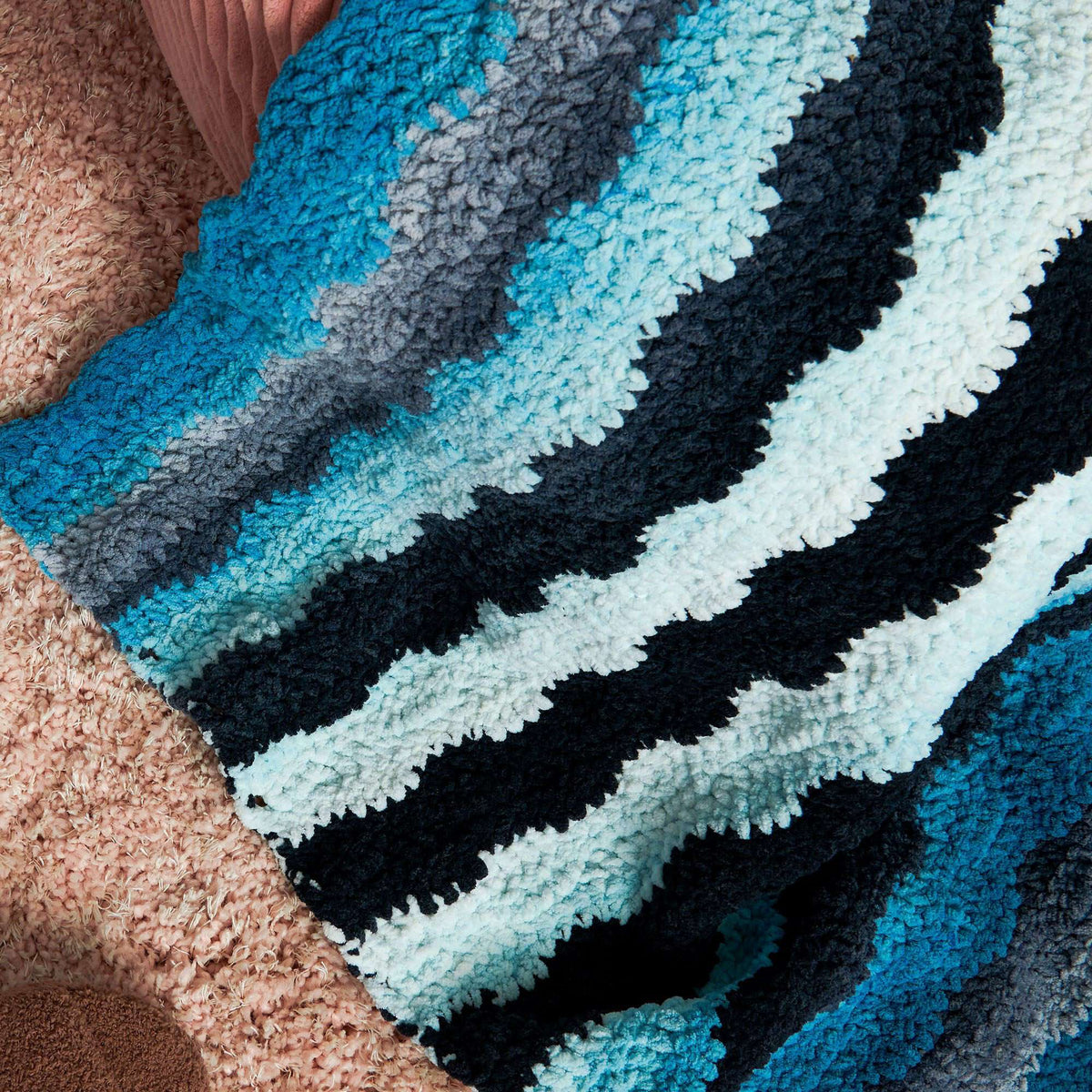 Crochet Blanket made in Bernat Blanket Perfect Phasing Yarn