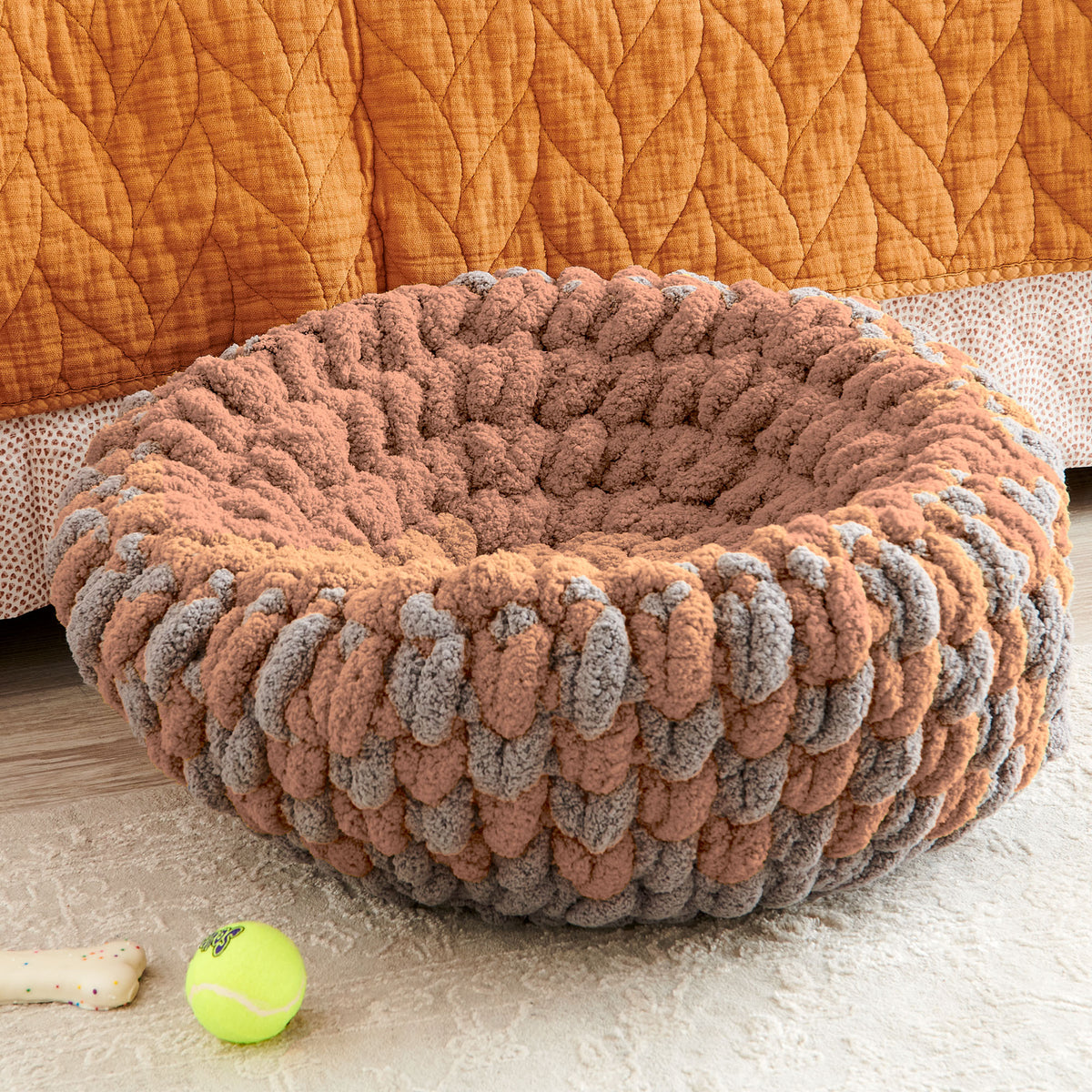 Hug Around Crochet Pet Ped made using Bernat yarn in a styled lifestyle setting