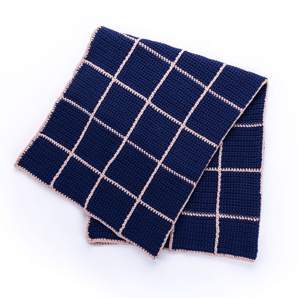 Crochet Dusk & Dawn Windowpane Blanket made using Bernat yarn