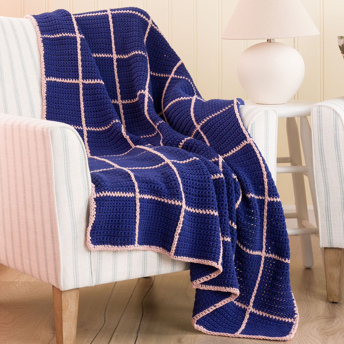 Crochet Dusk & Dawn Windowpane Blanket made using Bernat yarn