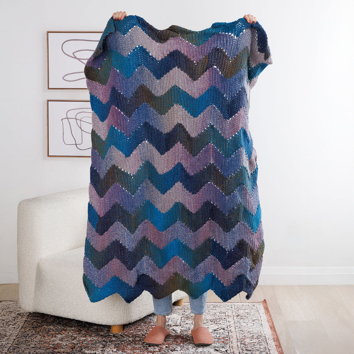 Join As You Zig Zag Crochet Blanket made using Bernat yarn in a styled lifestyle setting