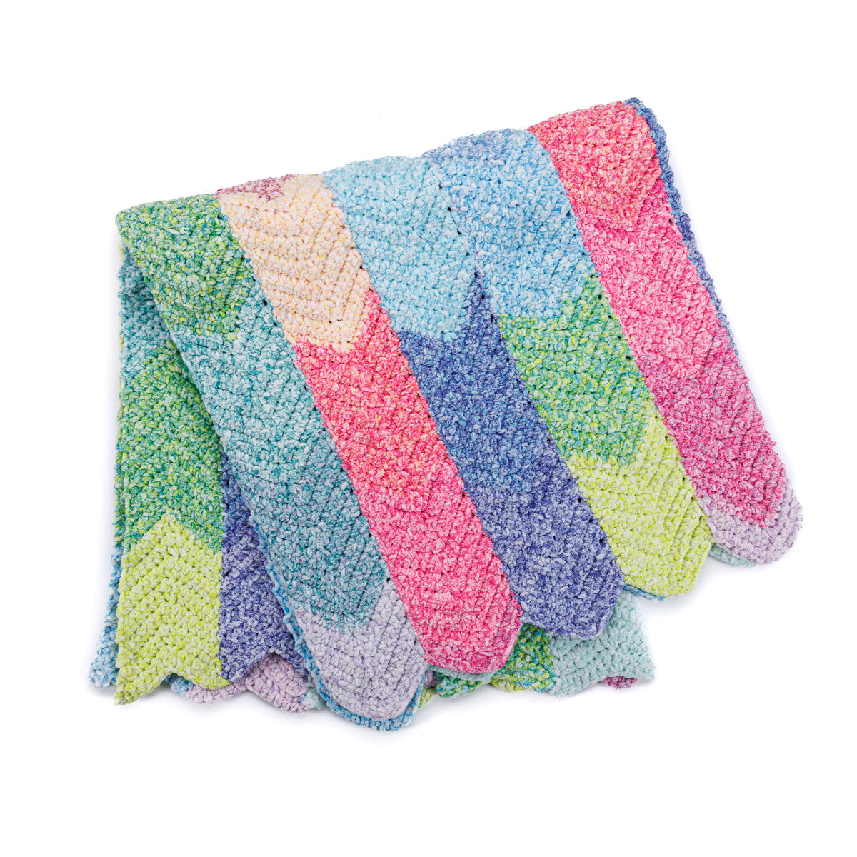 Color Cascade Crochet Blanket made using Bernat yarn in a styled lifestyle setting