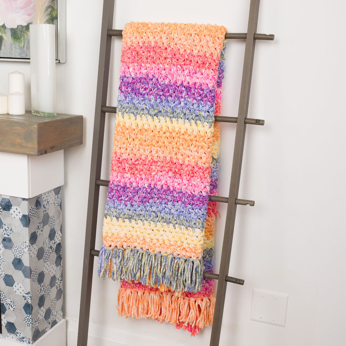 Morning Moss-Stitch Crochet Blanket made using Bernat yarn in a styled lifestyle setting