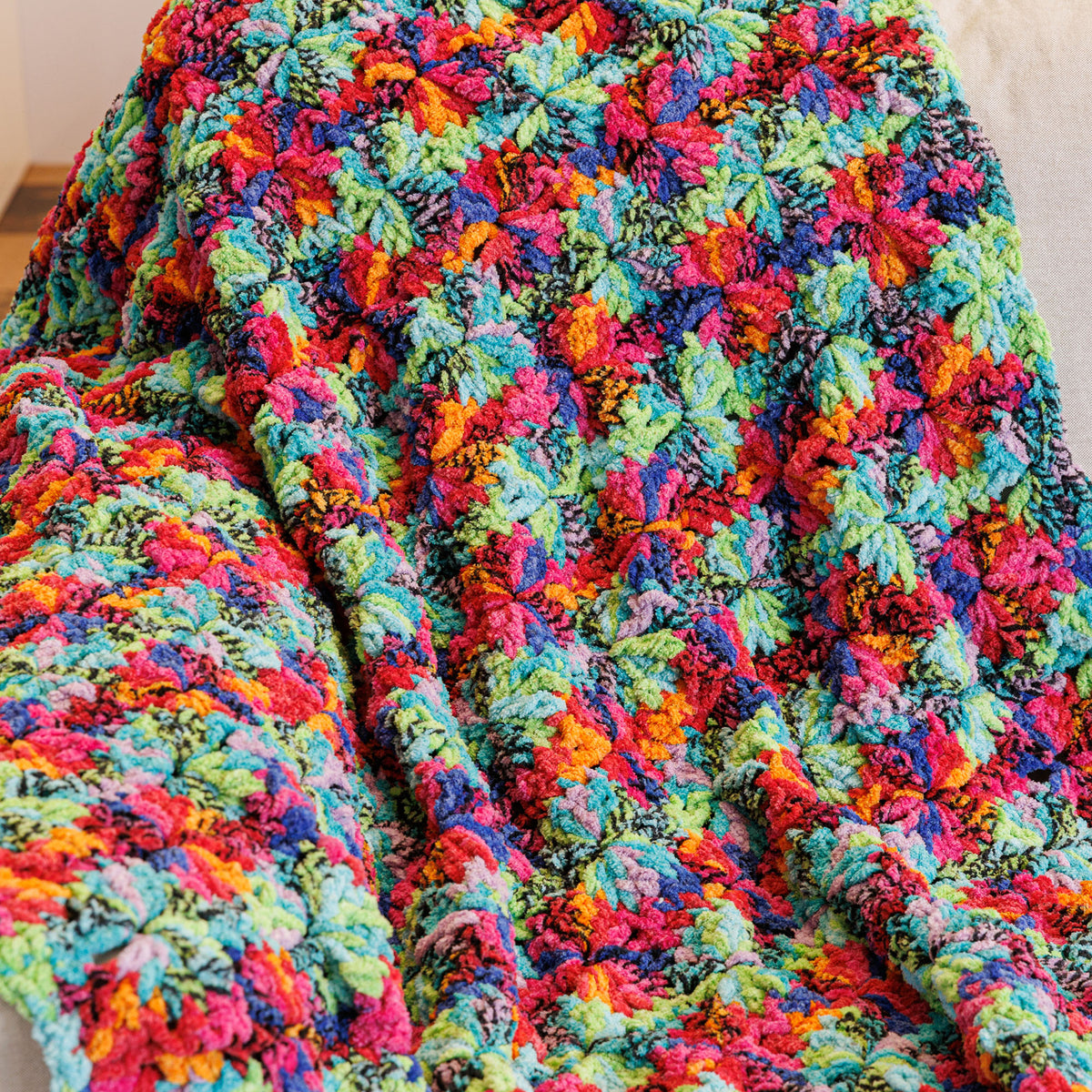Pinwheel Pop Crochet Blanket made using Bernat yarn