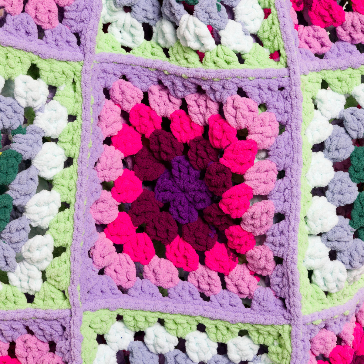 Fair And Square Crochet Blanket made using Bernat yarn