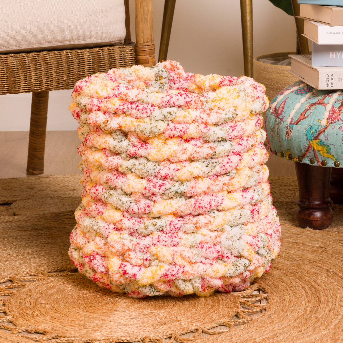 Round And Round Crochet Basket made using Bernat yarn in a styled lifestyle setting
