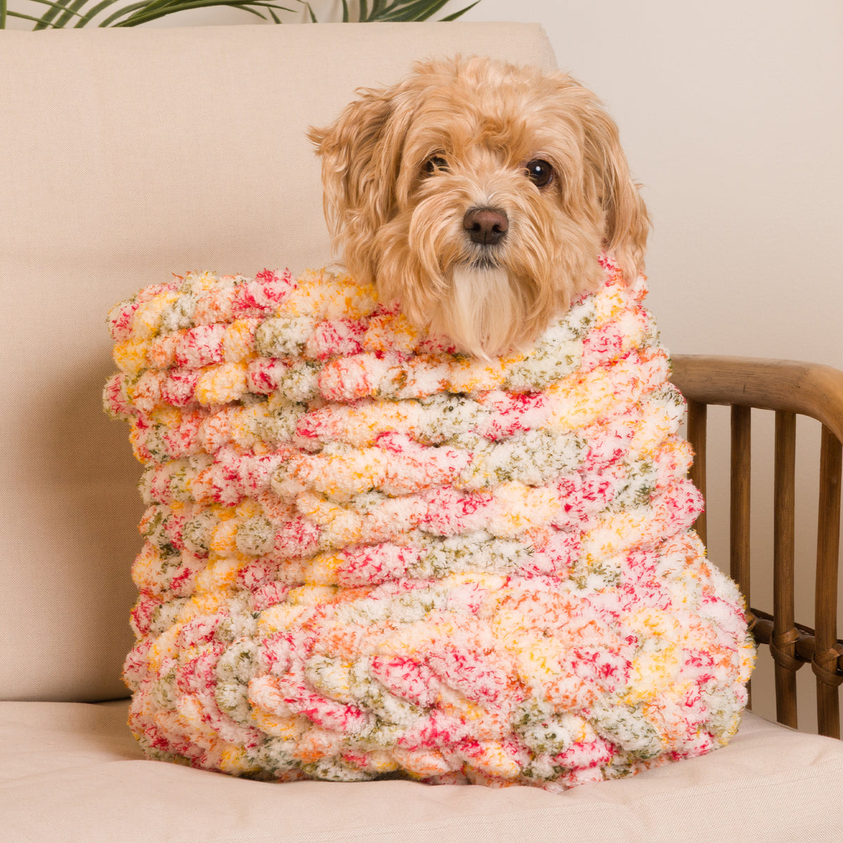 Round And Round Crochet Basket made using Bernat yarn in a styled lifestyle setting