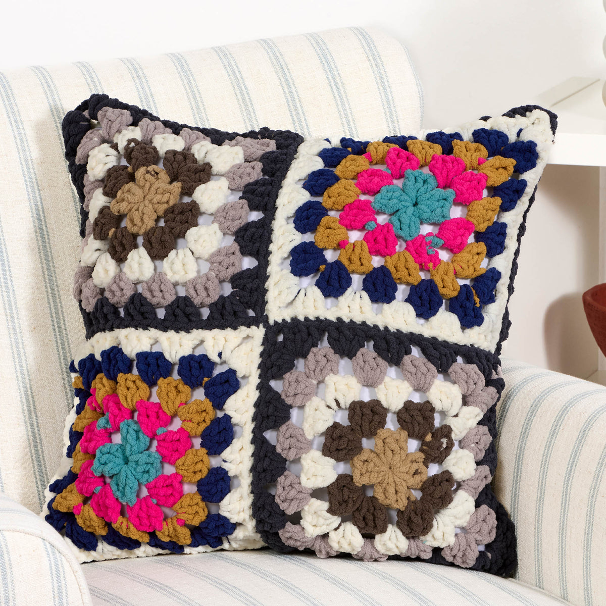 Crochet Check-Out Granny Pillow made using Bernat yarn