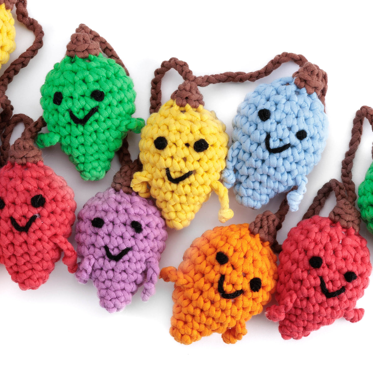 Crochet Lightbulb Guys Garland made using Bernat yarn