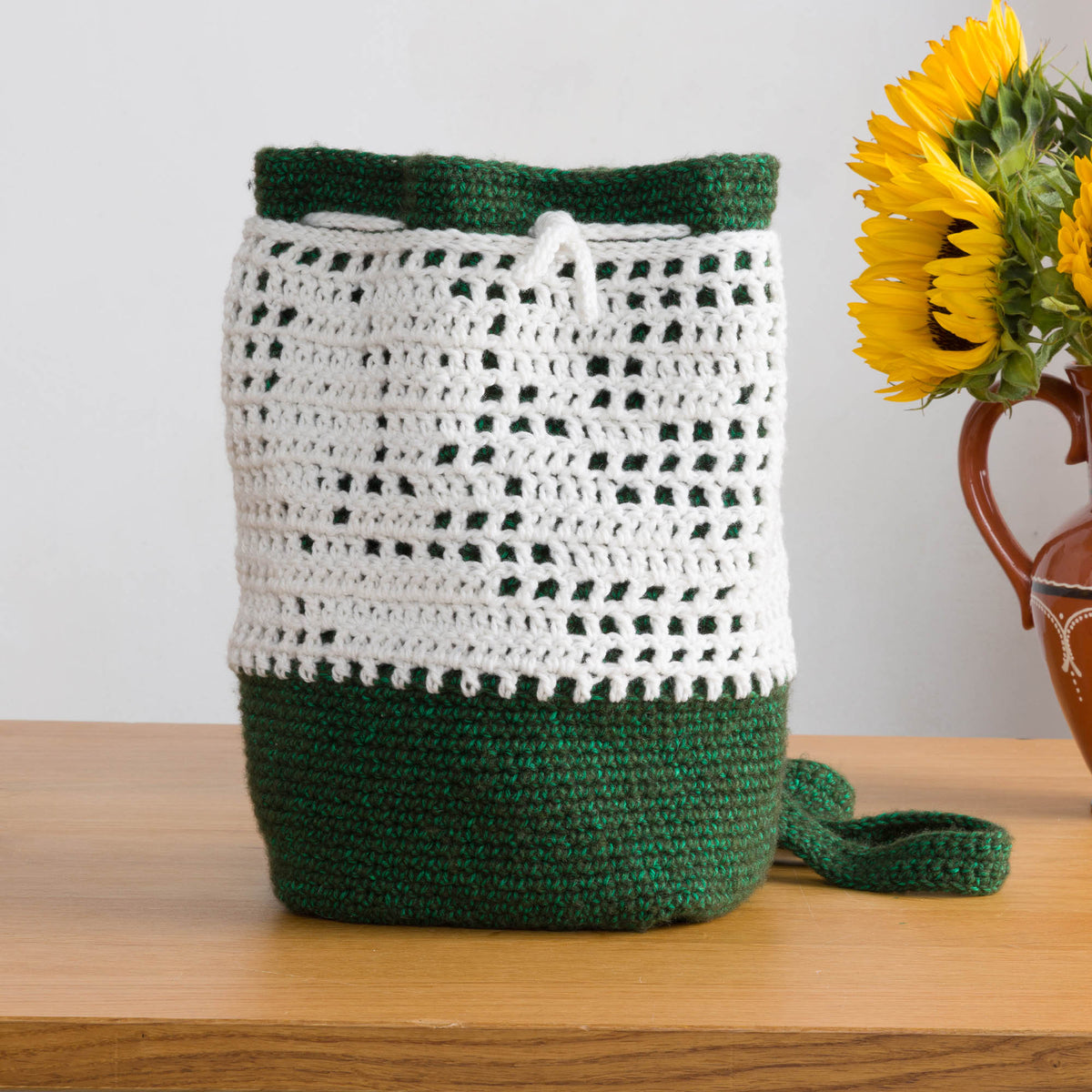 Crochet Filet Fern Backpack made using Bernat yarn