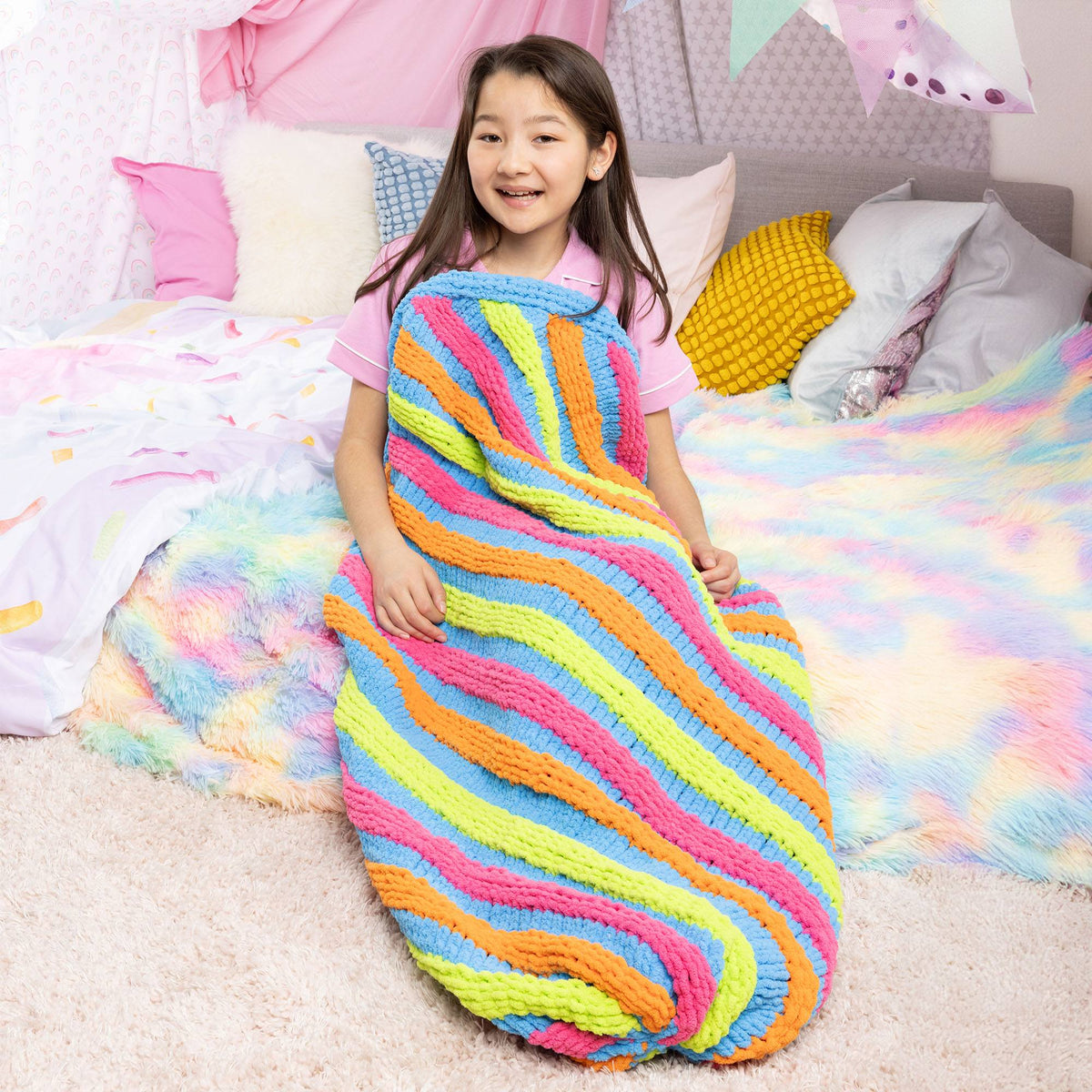 Rainbow Swirl Knit Snuggle Sack made using Bernat yarn