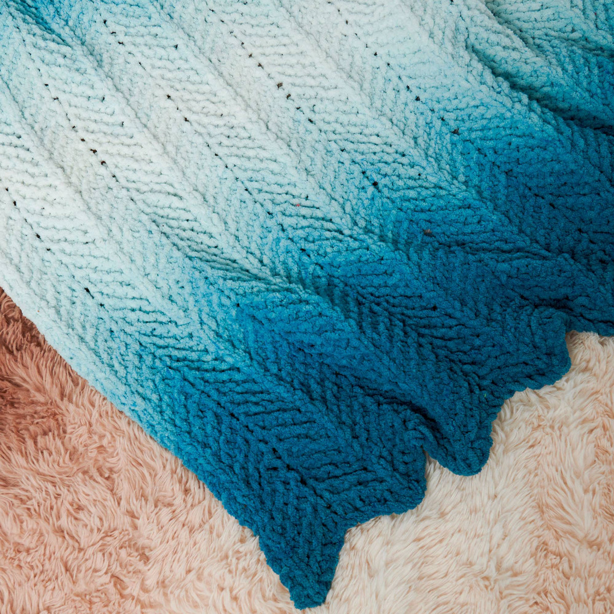 Knit Ripple Blanket For Home made using Bernat yarn