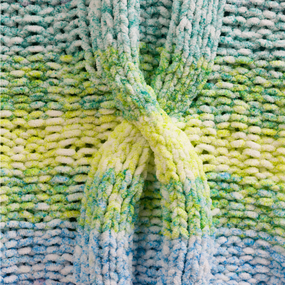 Cable Cloud Knit Blanket made using Bernat yarn