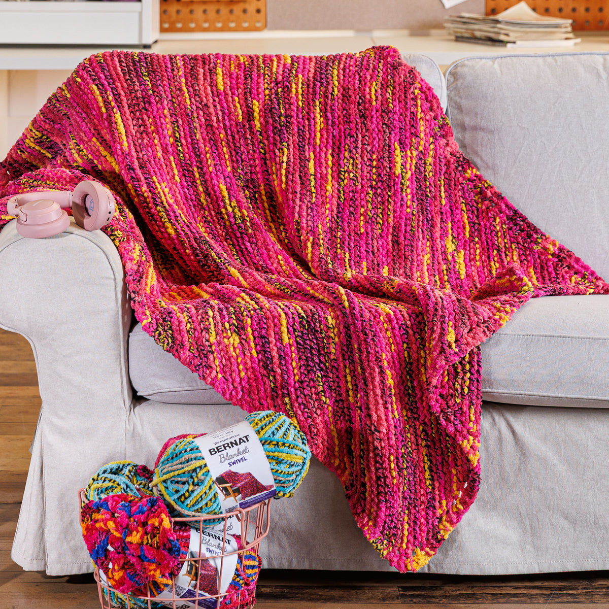 Tilted Spectrum Knit Blanket made using Bernat yarn
