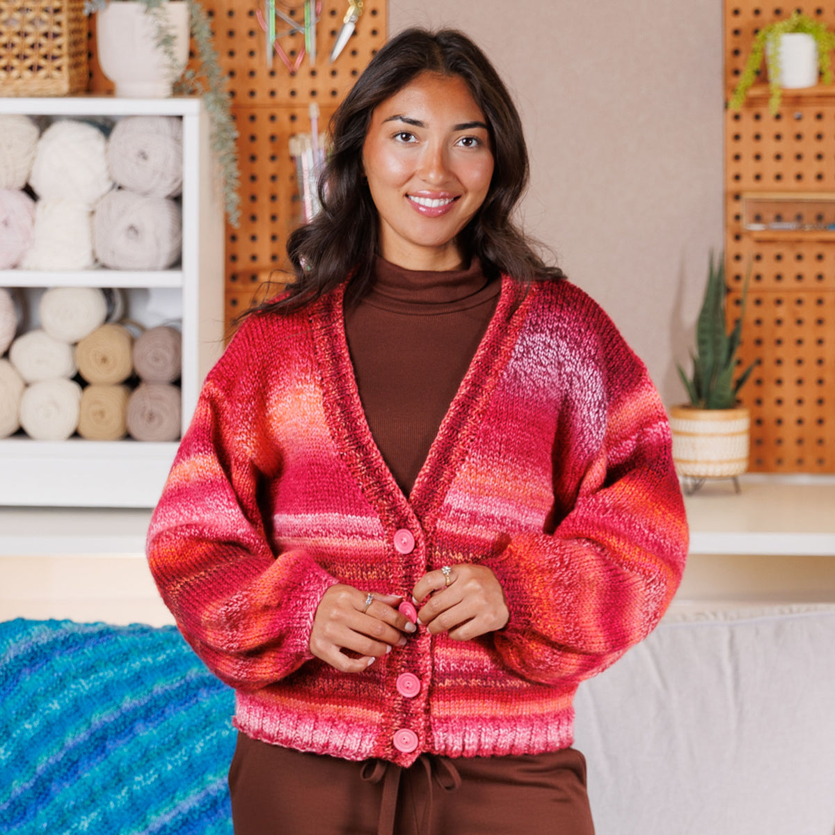 Knit Kinship Cardigan made using Bernat yarn in a styled lifestyle setting
