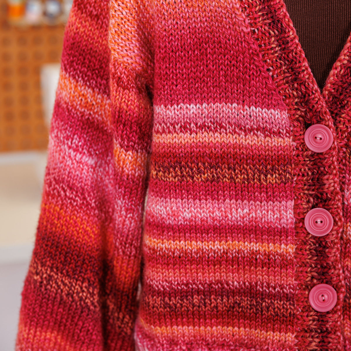 Knit Kinship Cardigan made using Bernat yarn in a styled lifestyle setting