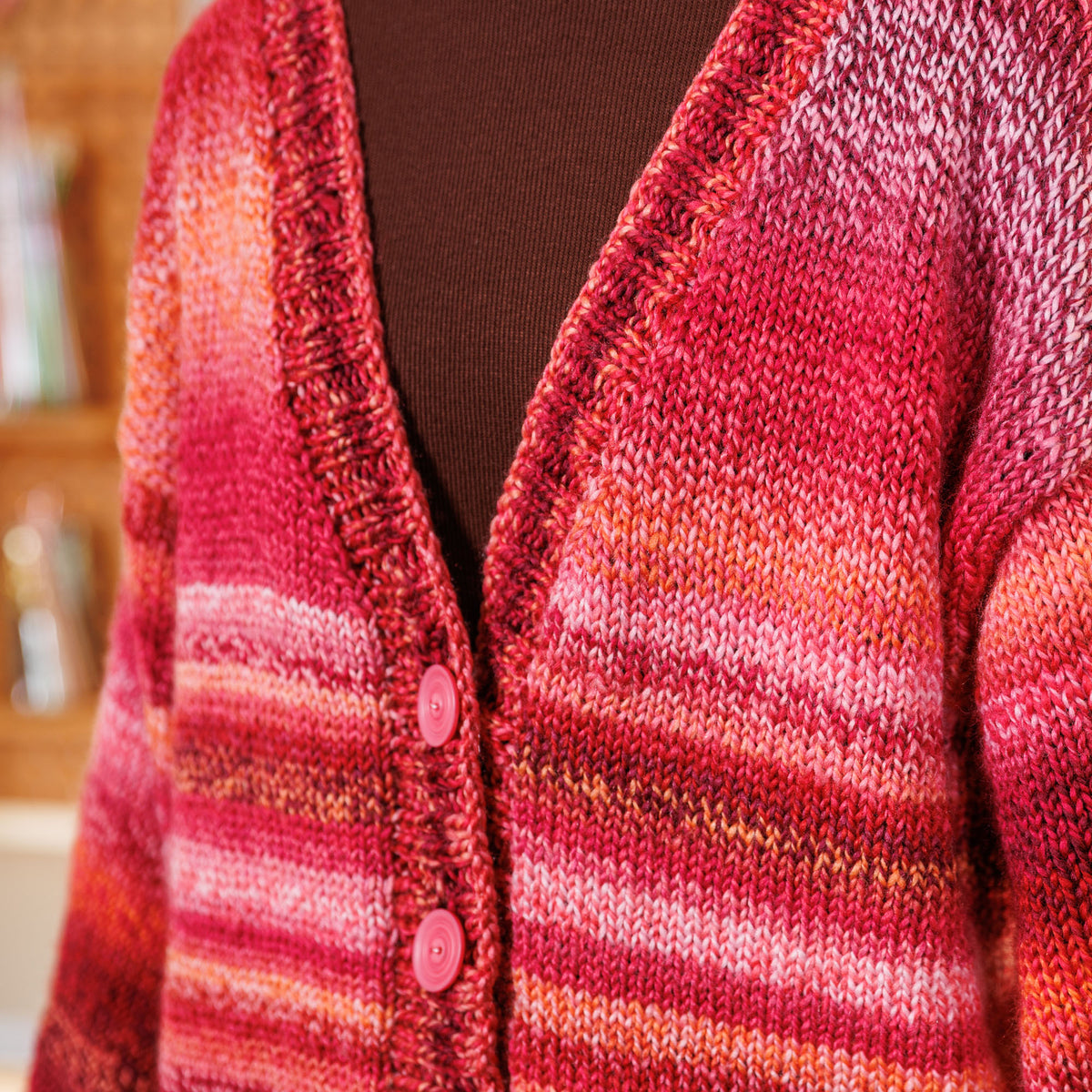 Knit Kinship Cardigan made using Bernat yarn in a styled lifestyle setting