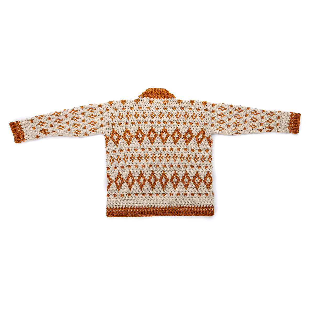 Diamond Dancer Crochet Cardigan made using Caron yarn in a styled lifestyle setting