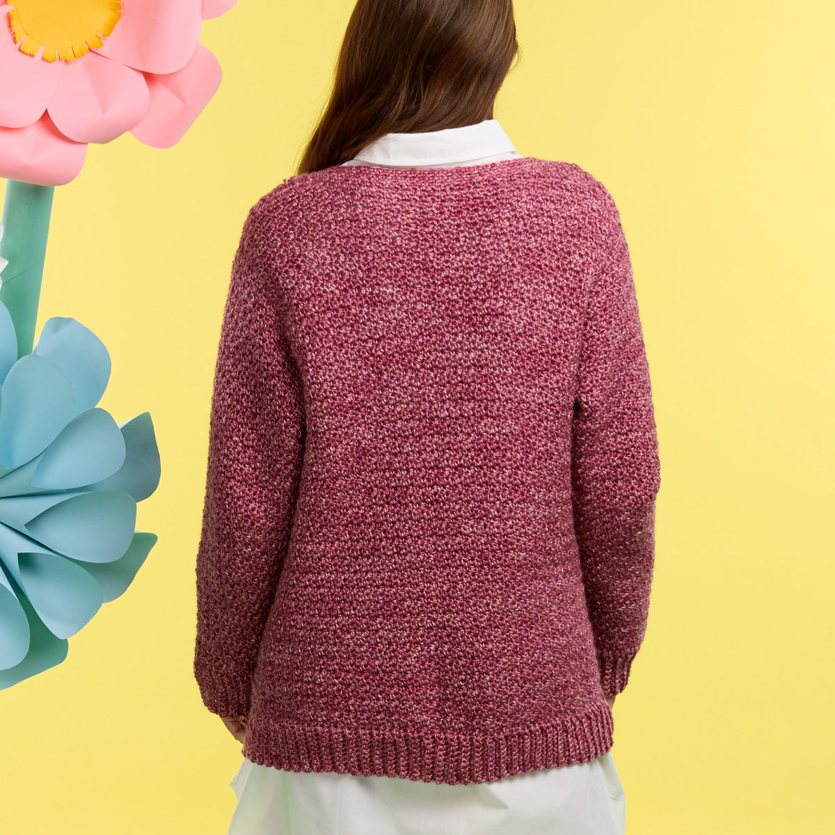 Simply Perfect Crochet Cardigan made using Caron yarn in a styled lifestyle setting