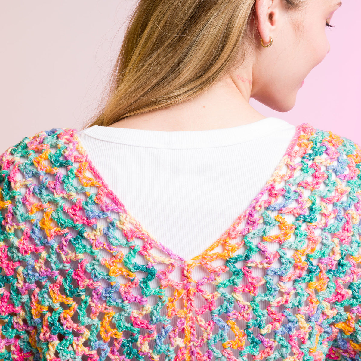 Crochet Side To Side Stripe Top made using Caron yarn in a styled lifestyle setting