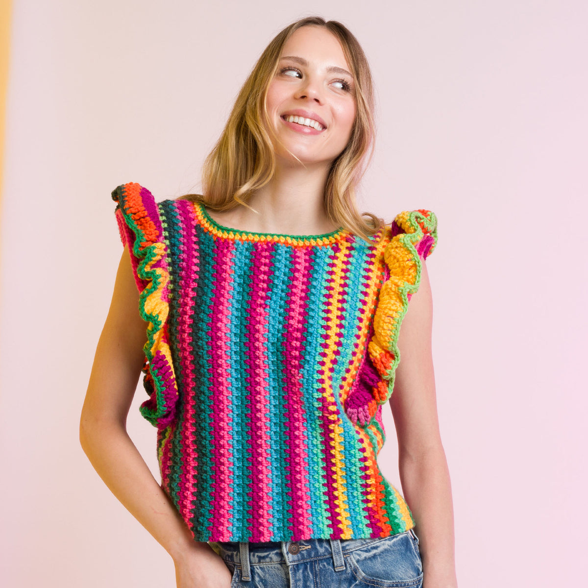 Ruffle Sleeve Striping Crochet Top made using Caron yarn in a styled lifestyle setting
