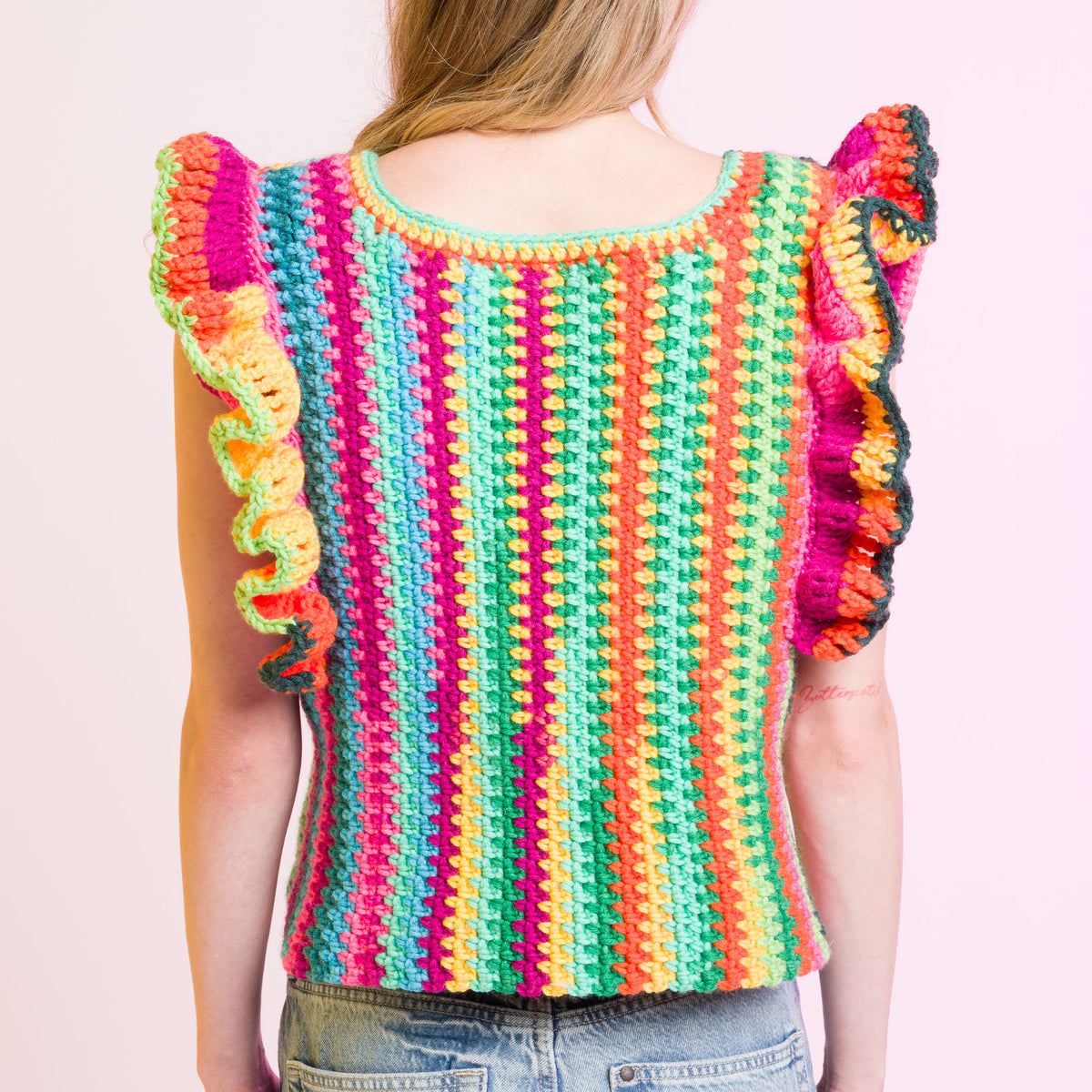 Ruffle Sleeve Striping Crochet Top made using Caron yarn in a styled lifestyle setting