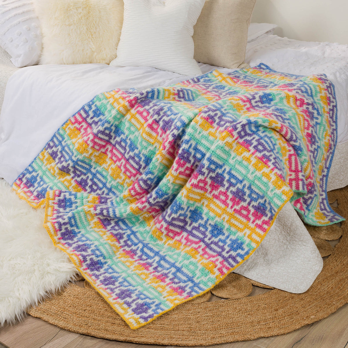 Mosaic Diamonds Crochet Blanket made using Caron yarn