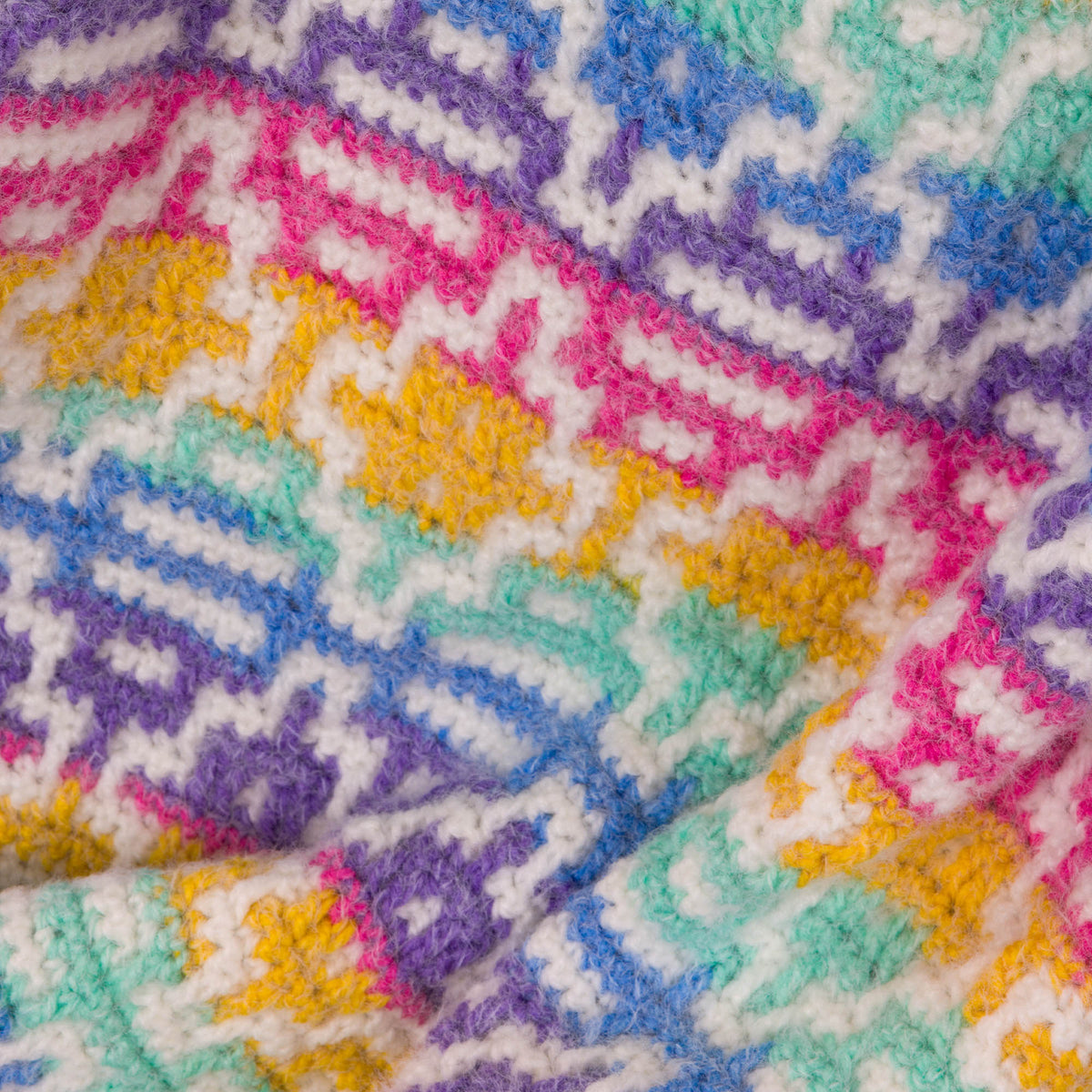 Mosaic Diamonds Crochet Blanket made using Caron yarn
