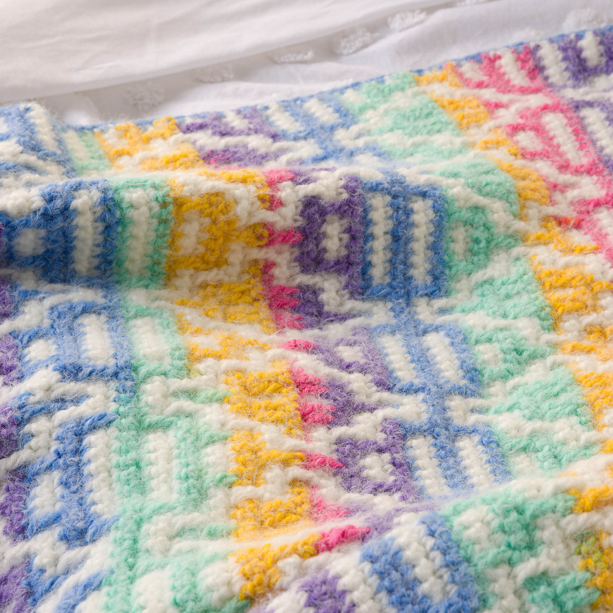 Mosaic Diamonds Crochet Blanket made using Caron yarn
