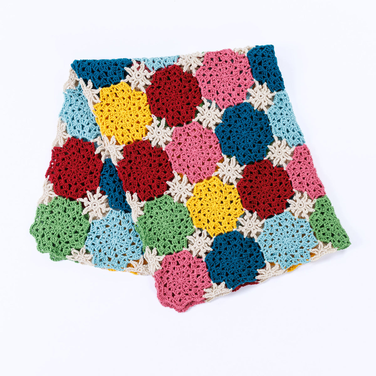 Crochet Snowflake Blocks Blanket made using Caron yarn