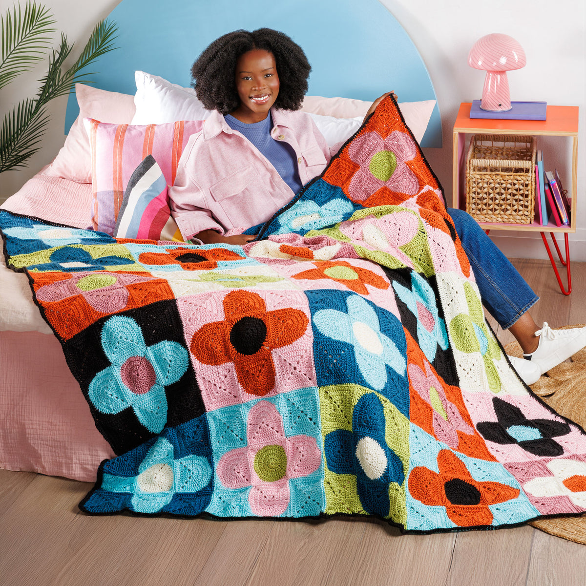 Floral Flux Crochet Quilt made using Caron yarn