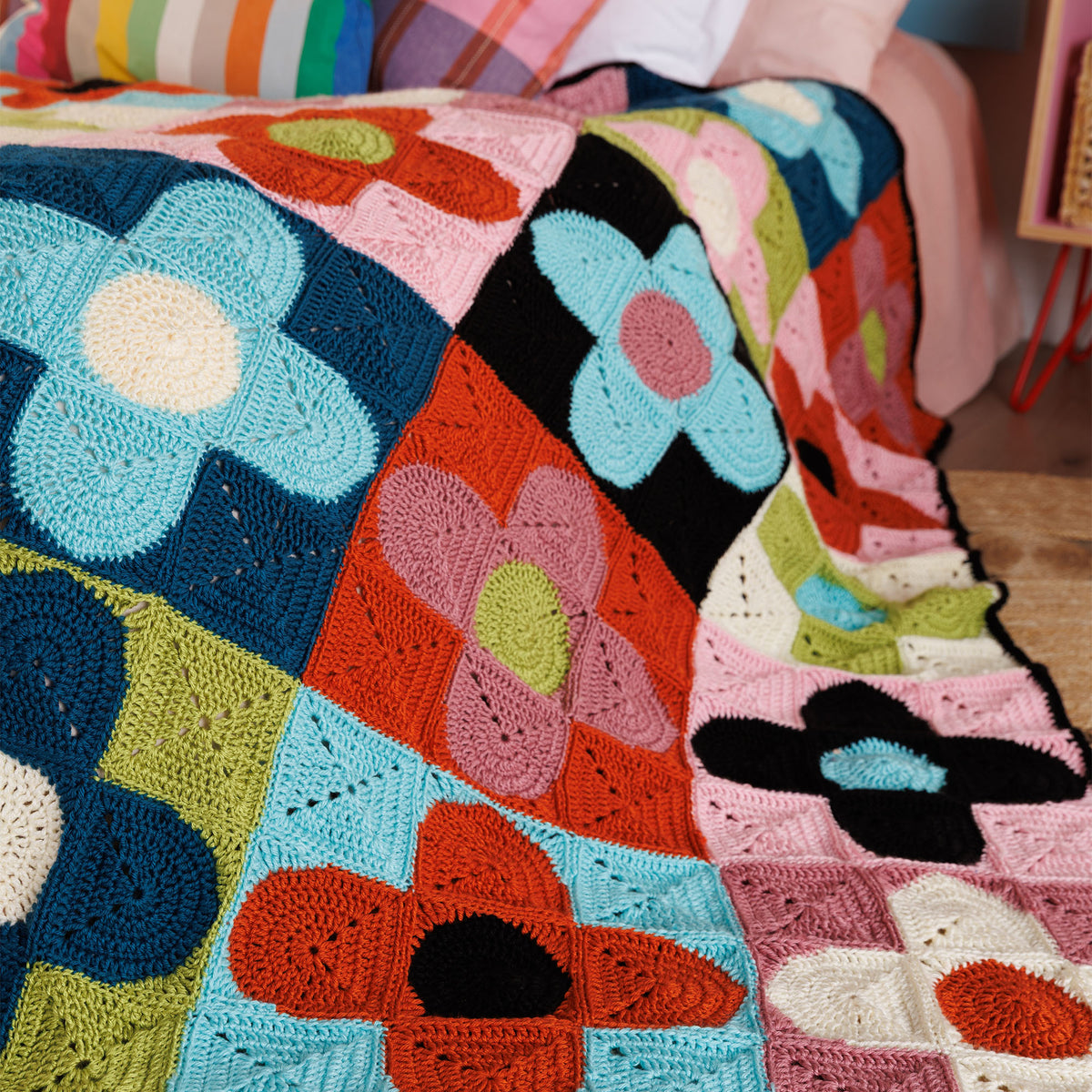 Floral Flux Crochet Quilt made using Caron yarn