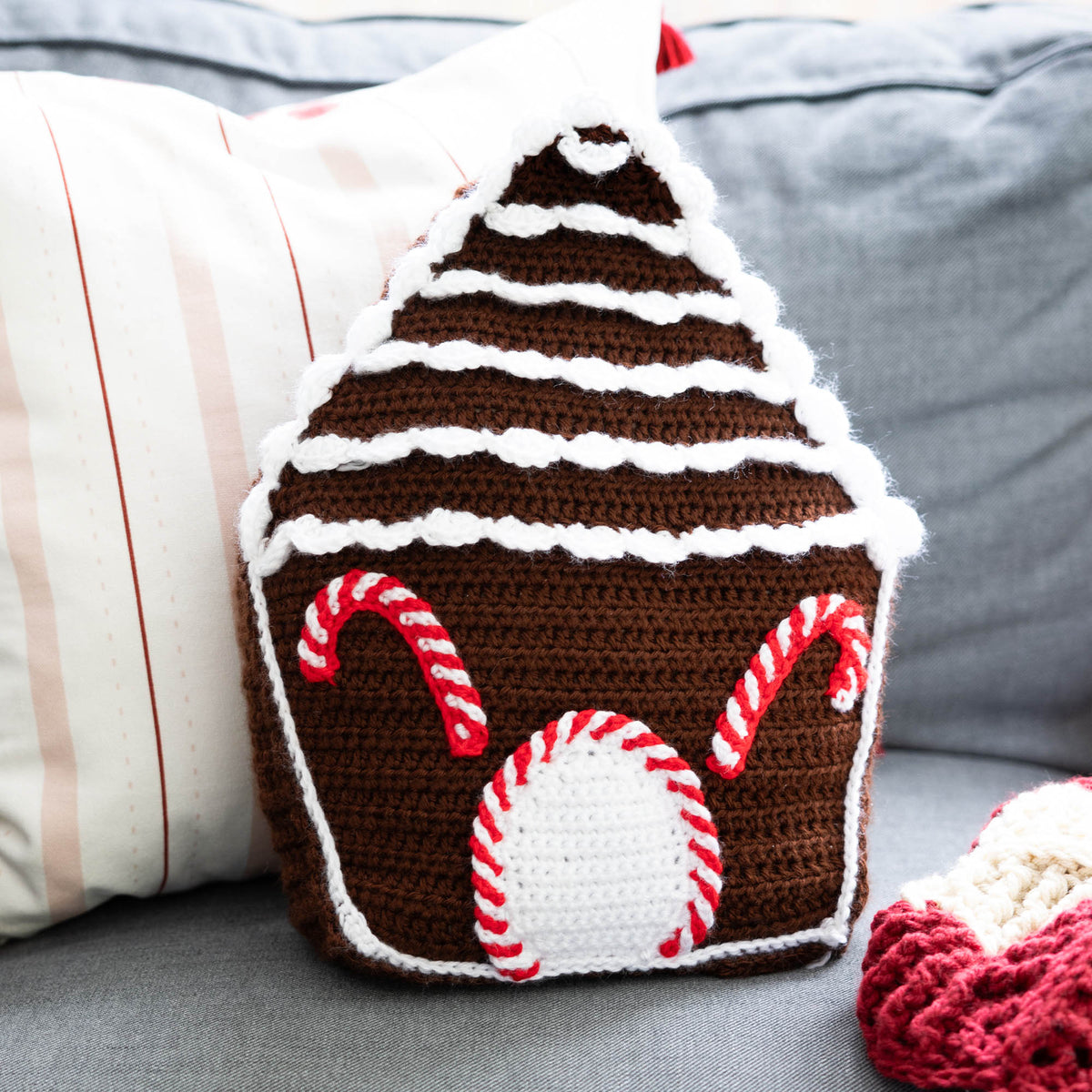 Crochet Gingerbread Pillow made using Caron yarn