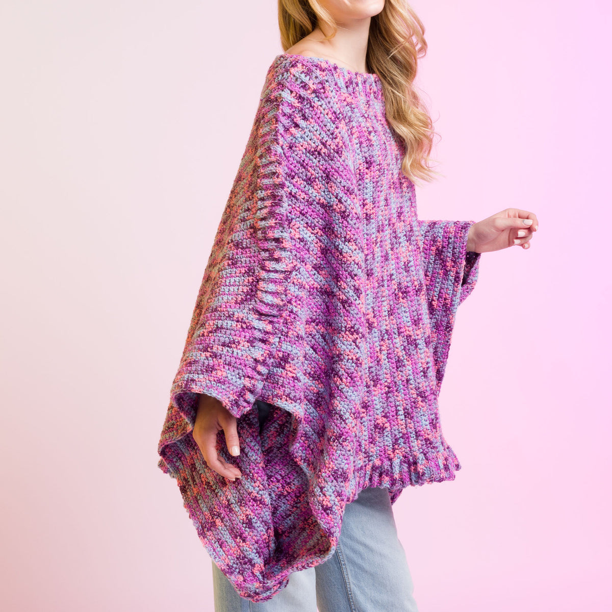 Crochet Ponch It Up Poncho made using Caron yarn in a styled lifestyle setting