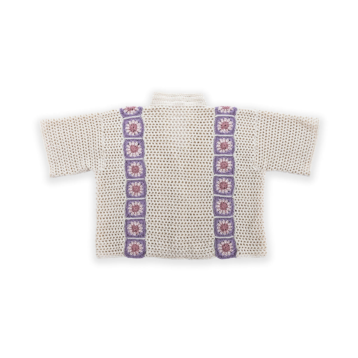 Crochet Cabana Shirt With Detail made using Caron yarn in a styled lifestyle setting