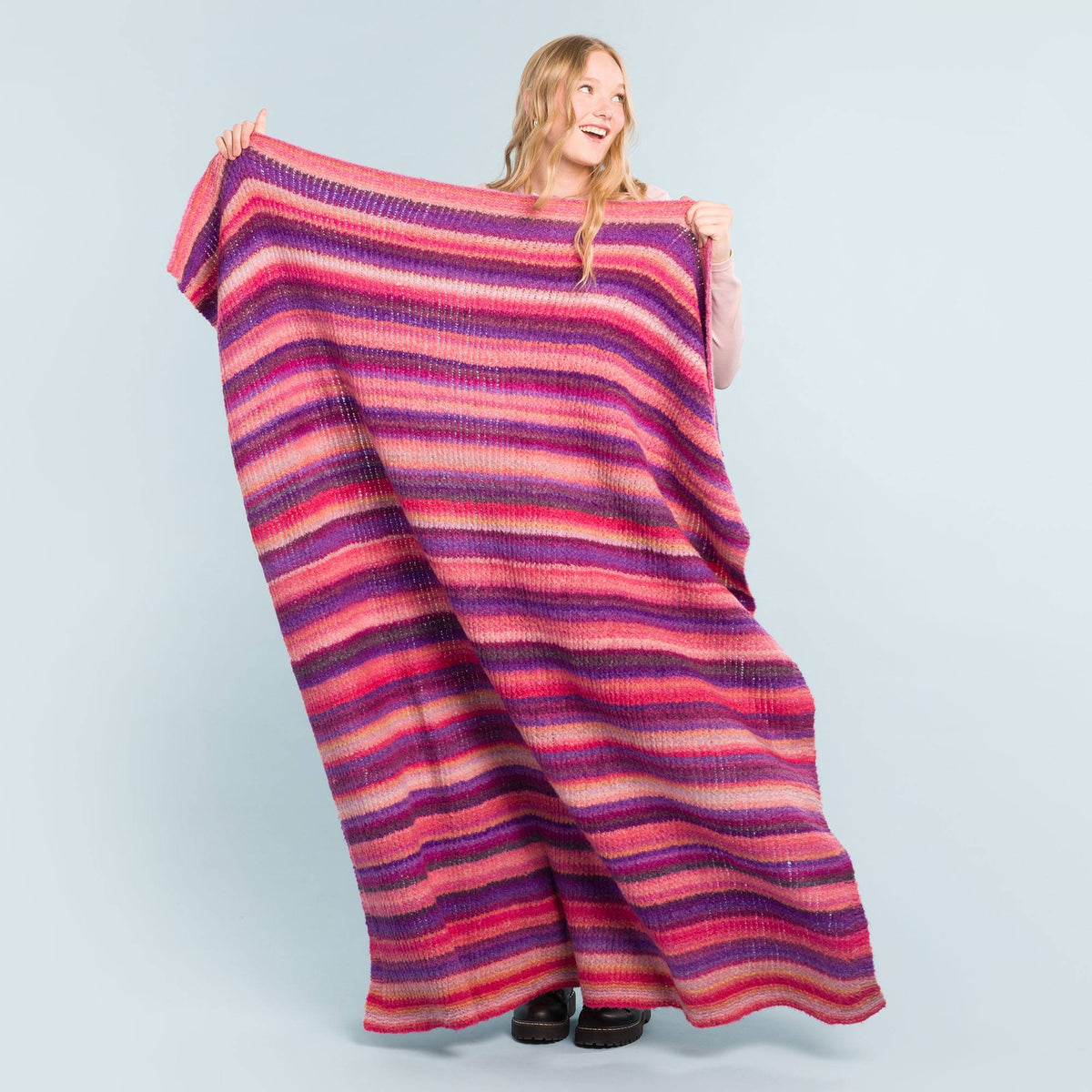 Mind The Fade Knit Blanket made using Caron yarn
