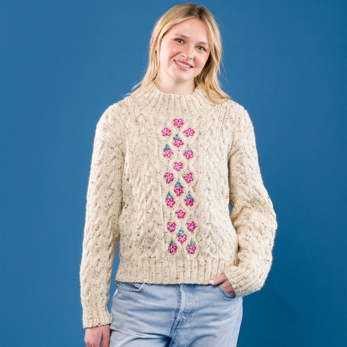 Floral Medallions Knit Pullover made using Caron yarn in a styled lifestyle setting