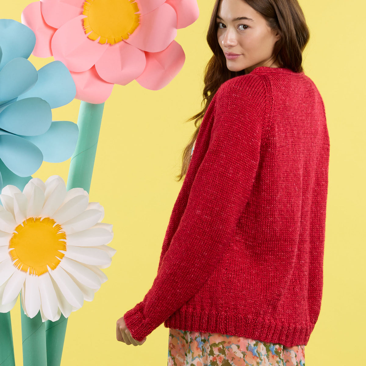 Good Neighbour Knit Cardigan made using Caron yarn in a styled lifestyle setting