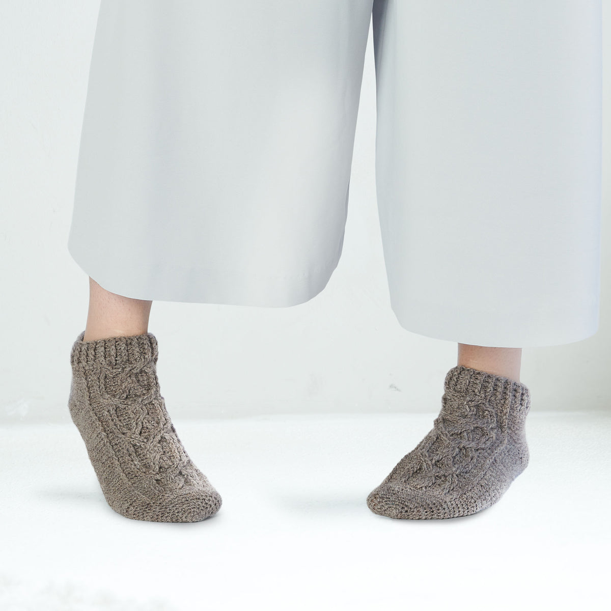 Toe-Up Cabled Crochet Socks made using Patons yarn