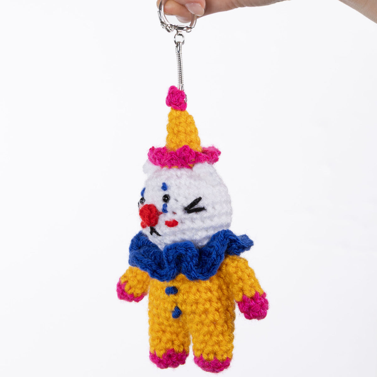 Cobbles The Cat Clown Crochet Charm made using Red Heart yarn