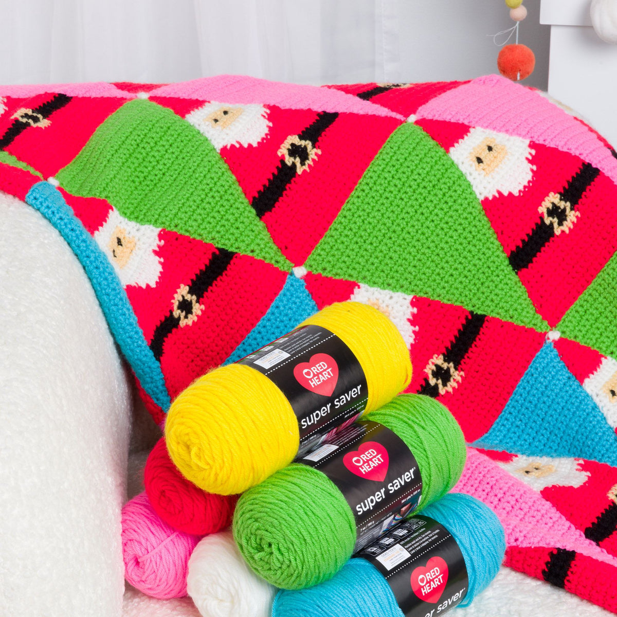 Santa'S Coming To Town Crochet Blanket made using Red Heart yarn