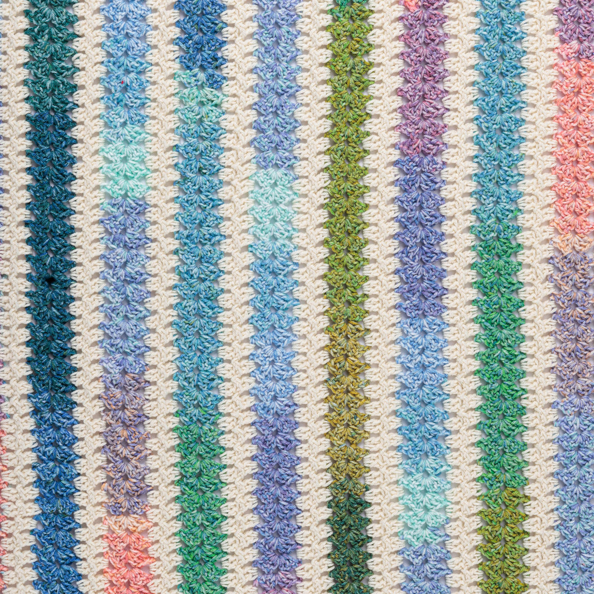 Zippy Strips Crochet Blanket made using Red Heart yarn