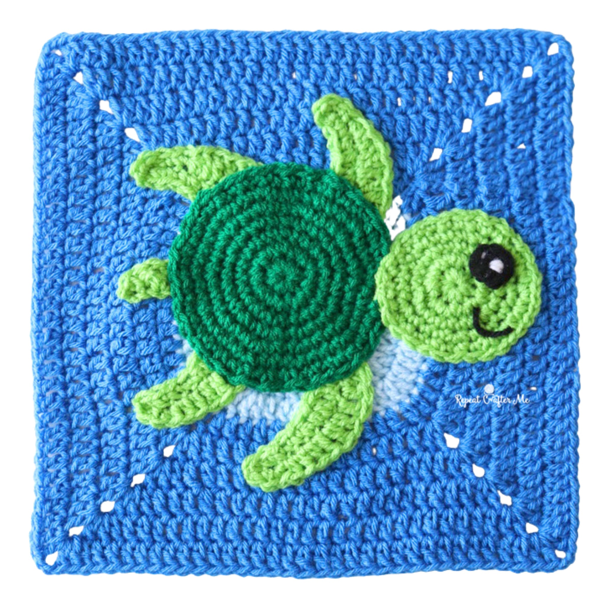 Under The Sea Crochet Blanket made using Red Heart yarn in a styled lifestyle setting