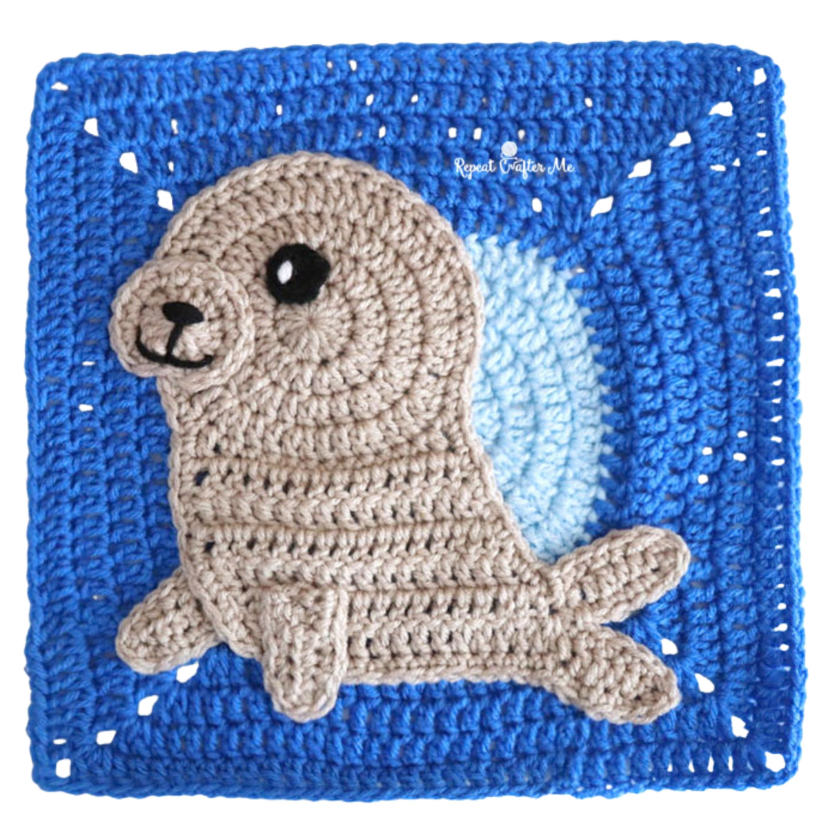 Under The Sea Crochet Blanket made using Red Heart yarn in a styled lifestyle setting