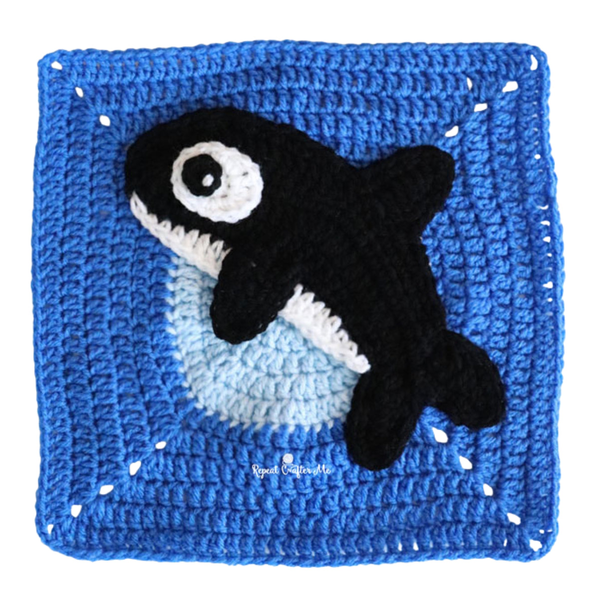 Under The Sea Crochet Blanket made using Red Heart yarn in a styled lifestyle setting